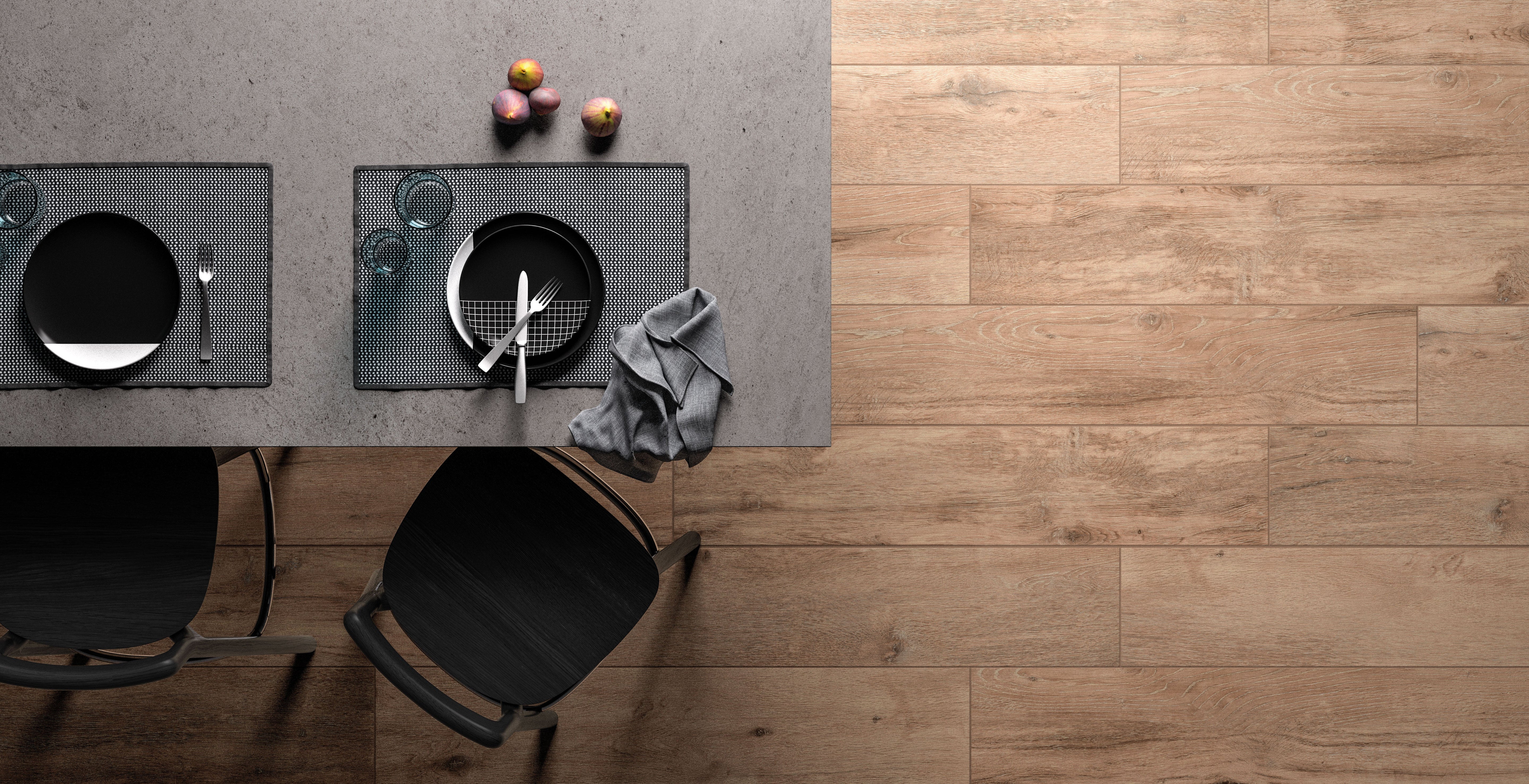 Porcelain tile collection featuring wood-look and concrete-look tiles in a modern kitchen setting by Surface Group.