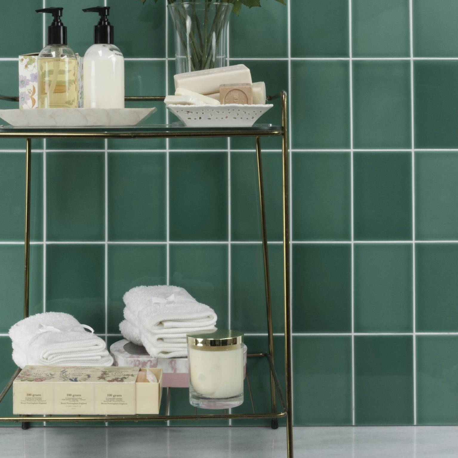 green ceramic tile wall covering in restaurant interior