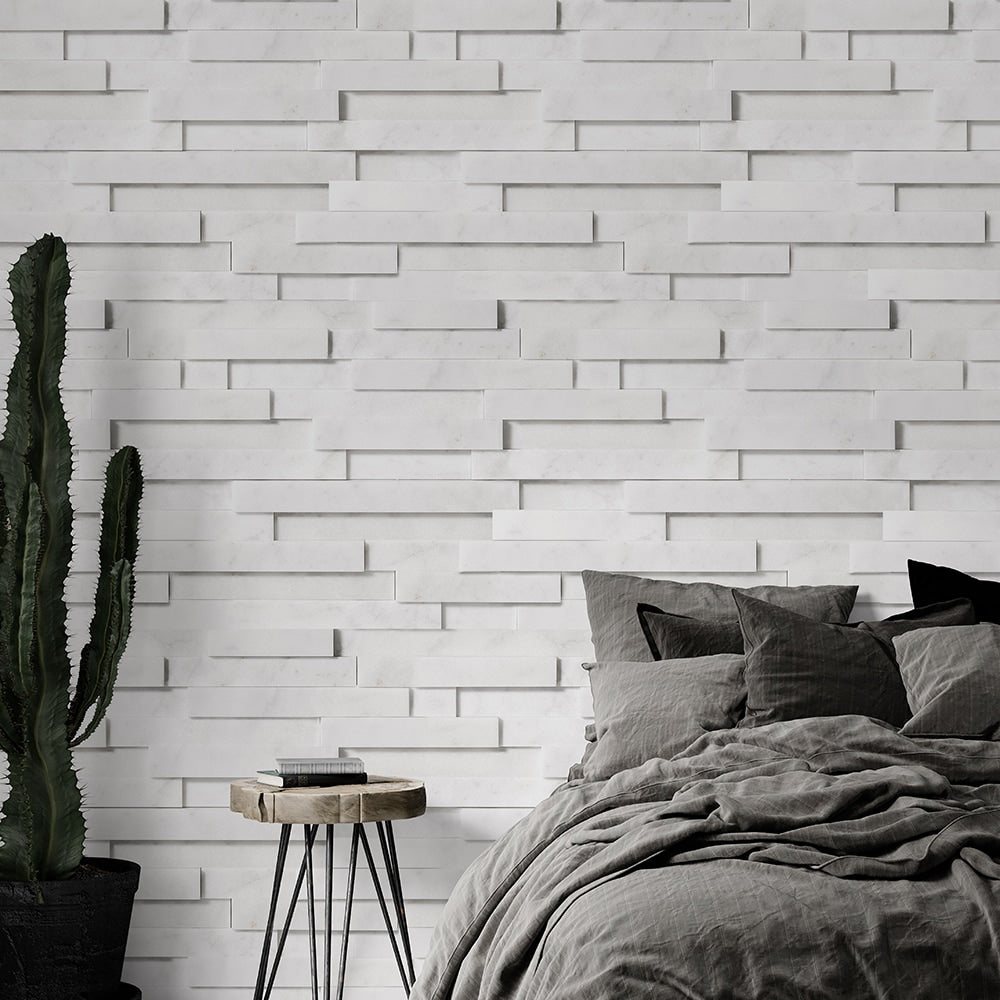 bedroom accent wall covered with beige marble ledger stone