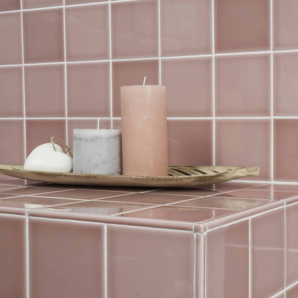 pink ceramic tile wall covering in restaurant interior