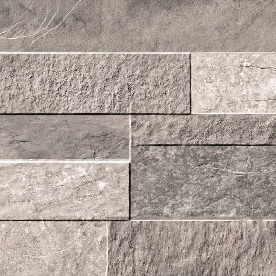 Porcelain ledgestone tile in varying shades of gray with a textured finish.