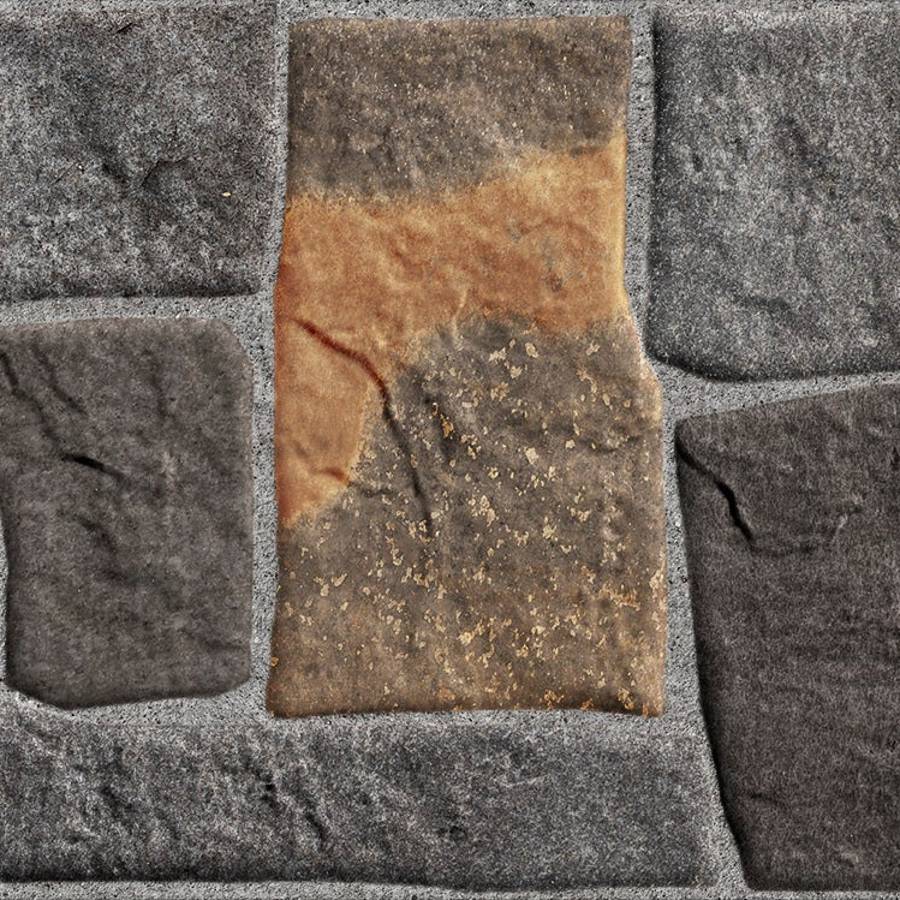 Porcelain tile with brown and gray tones resembling natural stone, ideal for flooring or wall installations.