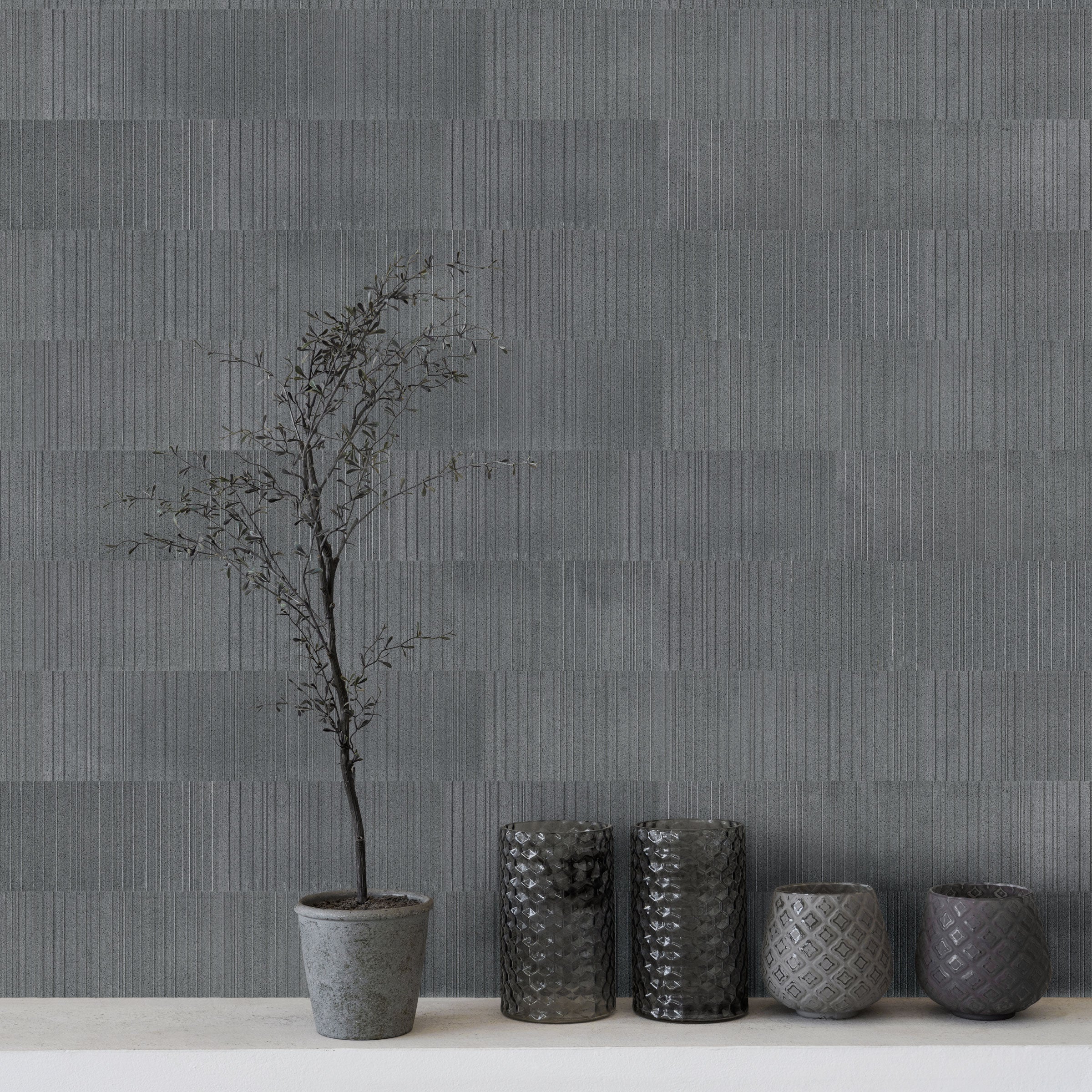 Reliefed tiles for dynamic interiors with tactile textures and visual depth in modern design.