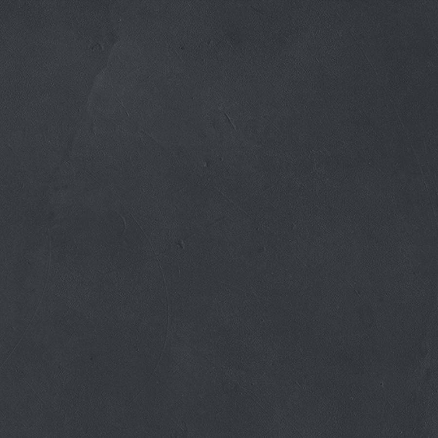 Porcelain tile with a dark, textured surface suitable for flooring and wall installations.