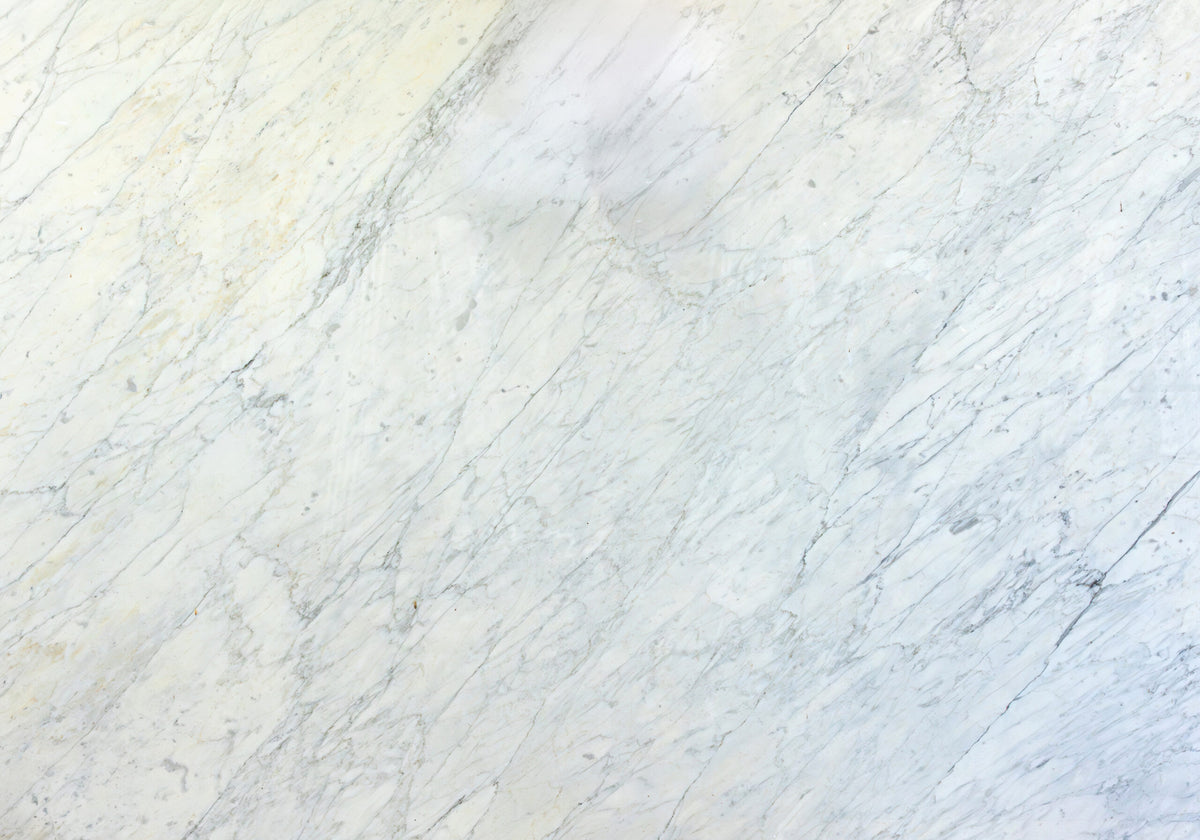 Marble Slabs Calacatta Miele marble slabs, top-down product view. Premium marble for floors and walls.