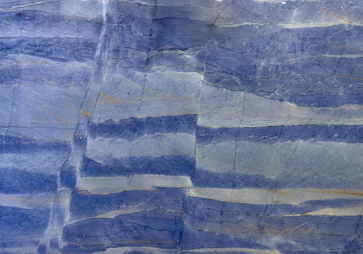 Quartzite Slabs Azul Boquira quartzite slabs, top-down product view. Premium quartzite for floors and walls.
