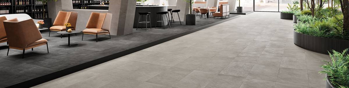 MADE.IN Freedom White porcelain pavers, lifestyle installation view 1, 12"×24"×11/32" size. Premium porcelain for floors and walls.