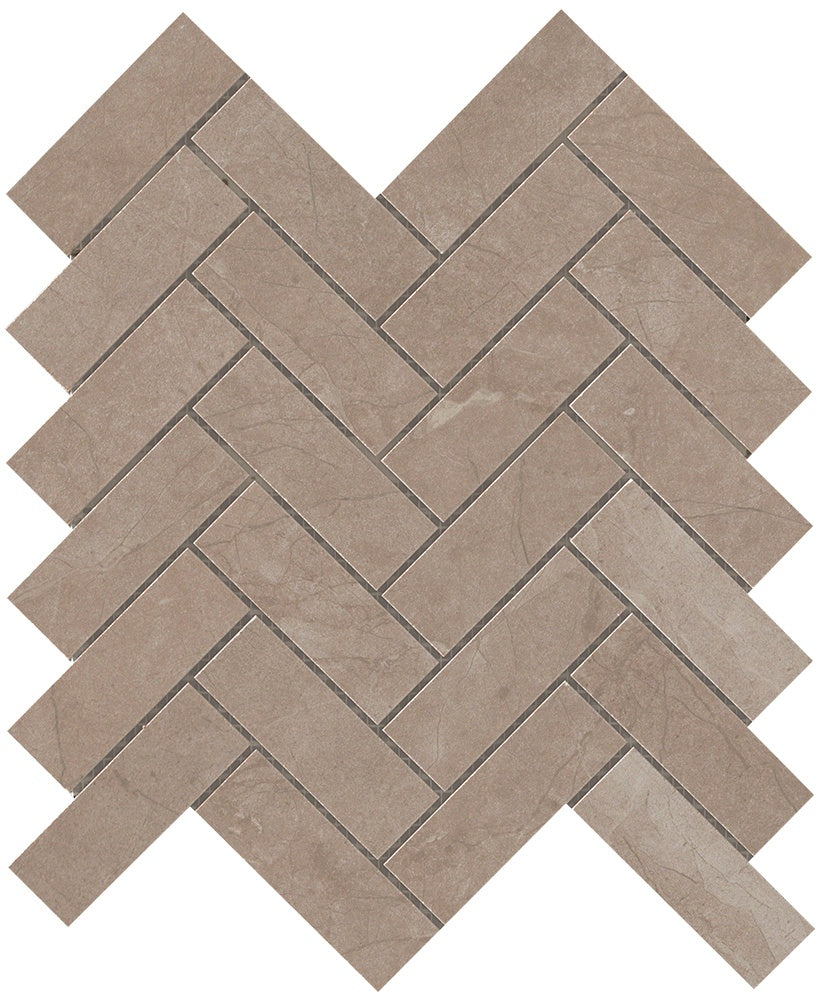 Matte herringbone mosaic in Corinthian Beige porcelain, evoking timeless marble elegance with refined, serene luxury.