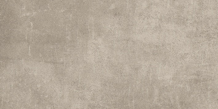 Matte porcelain tile in soft beige with delicate urban concrete texture and handcrafted reliefs for refined minimalist spaces.