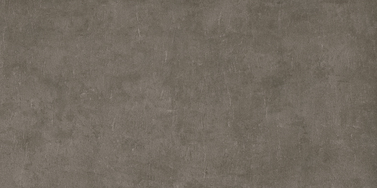 Handcrafted urban concrete-look porcelain tile in storm, with delicate reliefs and a matte finish for refined minimalist spaces.