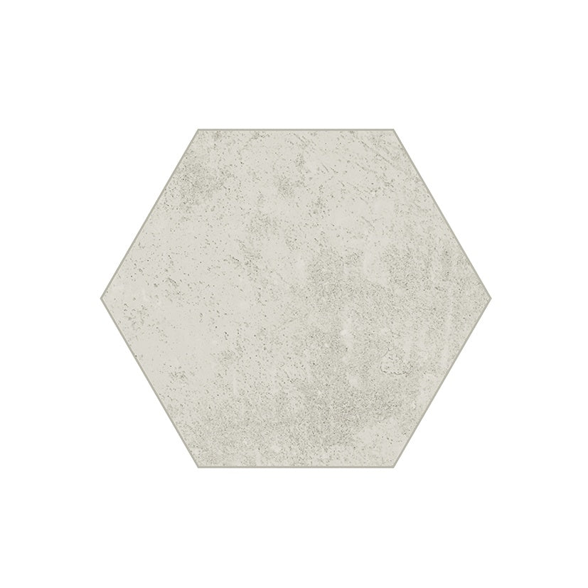 Hexagonal porcelain tile in soft linen with matte concrete texture, delicate reliefs, and handcrafted urban elegance for refined interiors.
