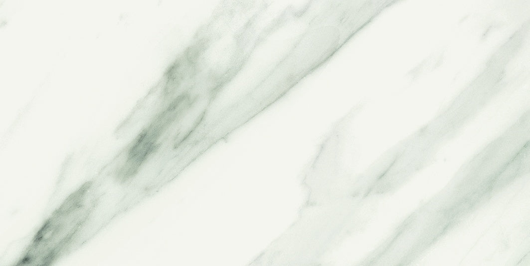 Elegant matte porcelain tile with soft gray veins on bright white, evoking timeless Volakas marble in a refined, minimalist design.