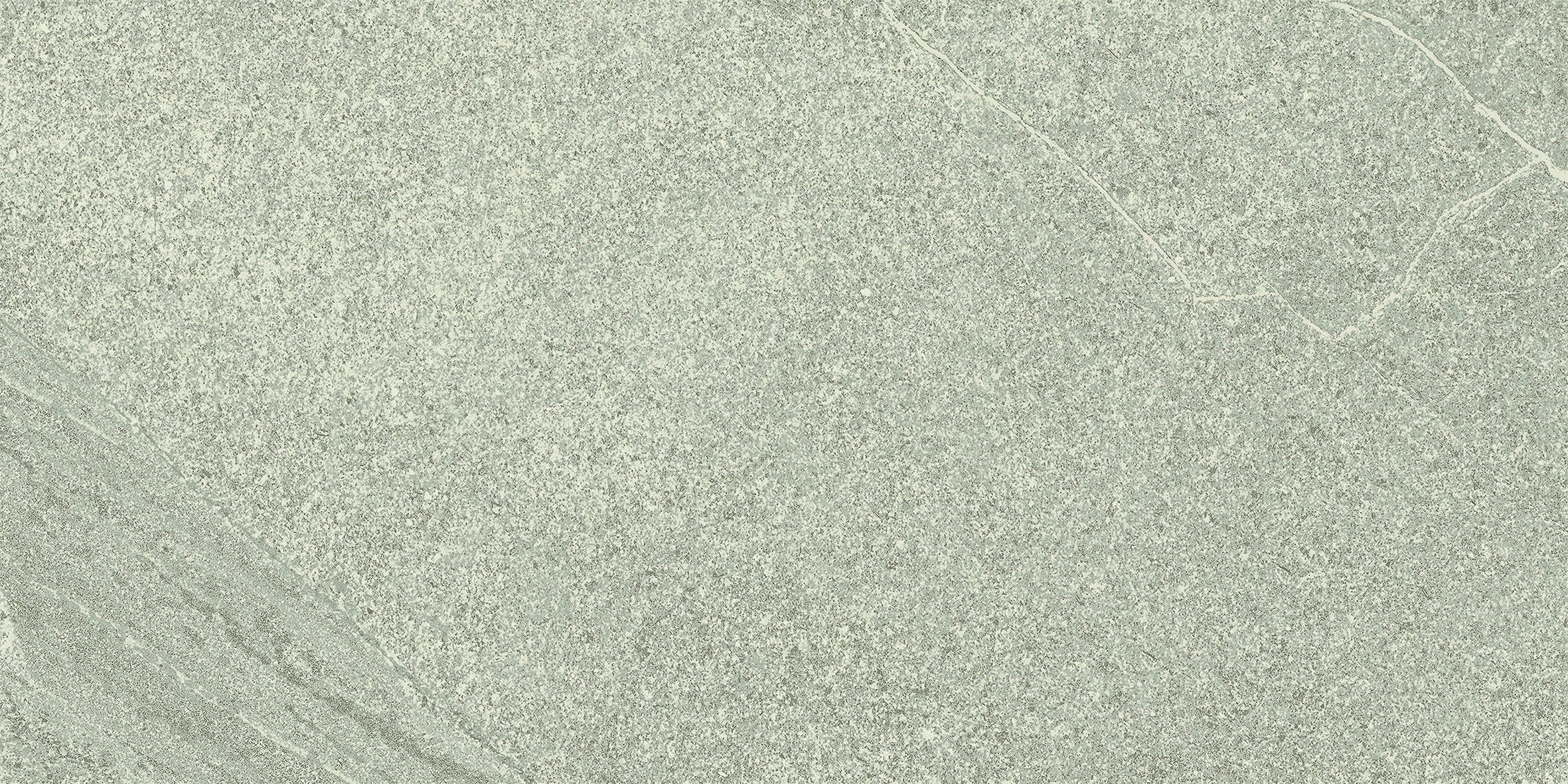 Elegant matte limestone-look porcelain tile with subtle quartz grains in a refined silver-green hue, exuding organic modern sophistication.