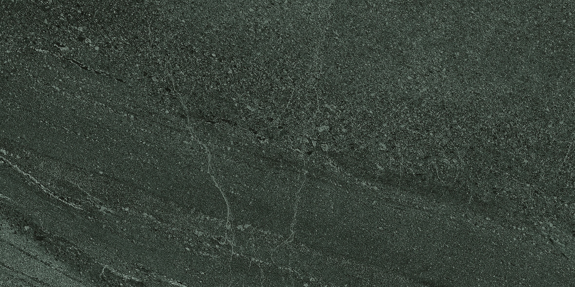 Elegant matte porcelain tile with deep limestone texture and subtle quartz grains in refined dark gray.