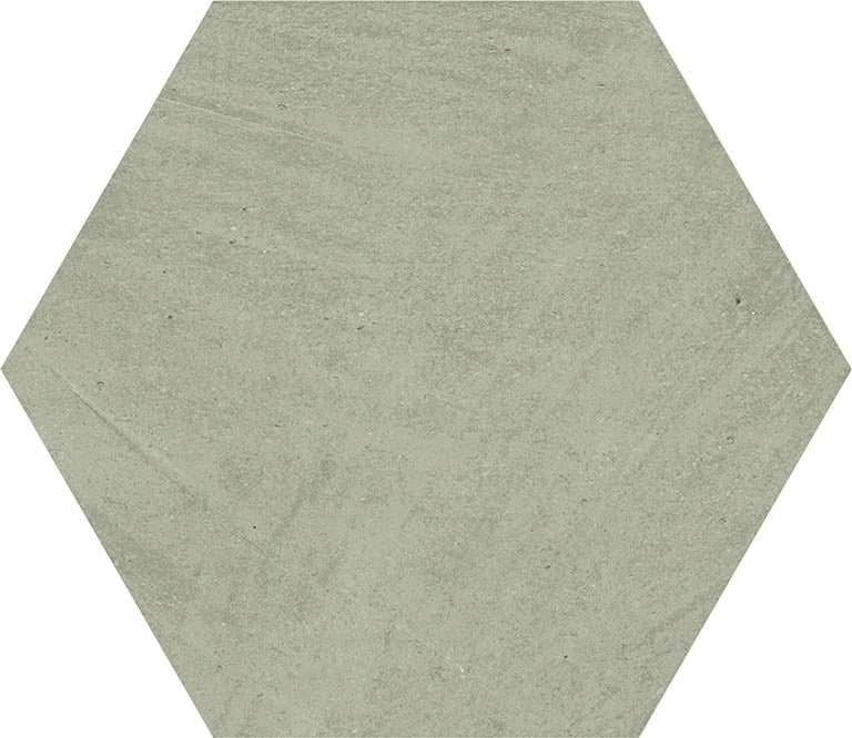 Hexagonal matte porcelain tile in soft fog gray with an organic, handcrafted cotto look, radiating earthy warmth and bohemian elegance.