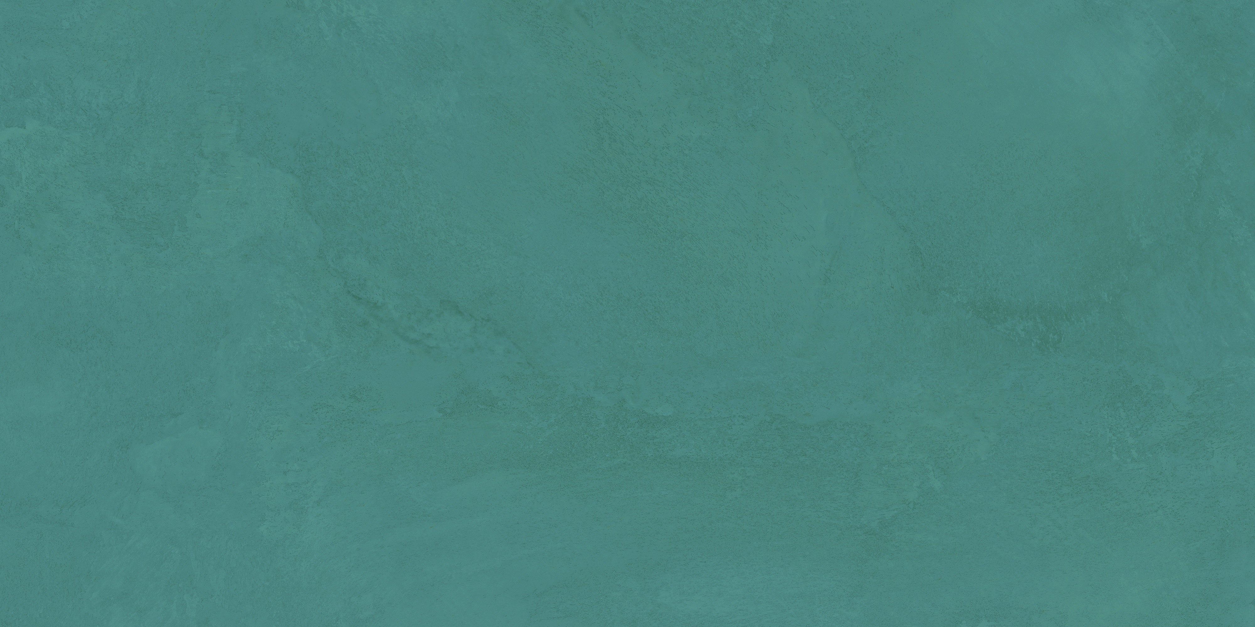Matte denim-green porcelain tile with smooth, earthy texture and vibrant pigment, evoking raw clay and modern tranquility.