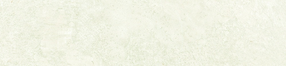 Smooth matte white porcelain tile with raw earth texture, evoking serene harmony and timeless organic elegance.