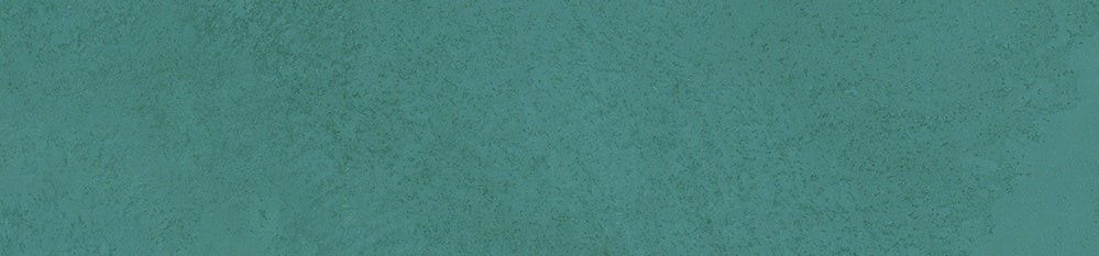A serene denim-green porcelain tile with smooth matte texture, evoking raw earth and timeless organic harmony.
