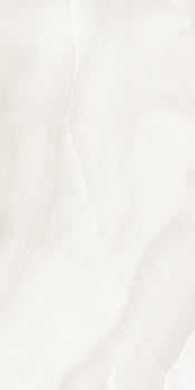 Matte white porcelain wall tile with refined onyx veins, evoking timeless elegance and sculptural luxury for contemporary interiors.