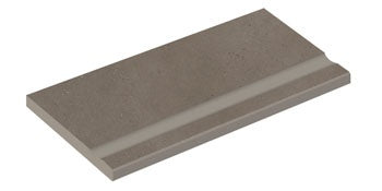 Sleek dark beige porcelain pool edge with a matte, textured finish, evoking the organic elegance of sedimentary rock and urban minimalism.