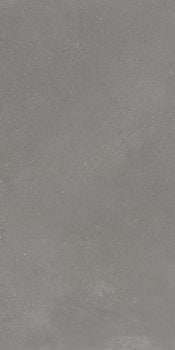 Rectified matte porcelain tile in soft gray, evoking sedimentary rock with a sleek, minimalist edge for modern interiors.