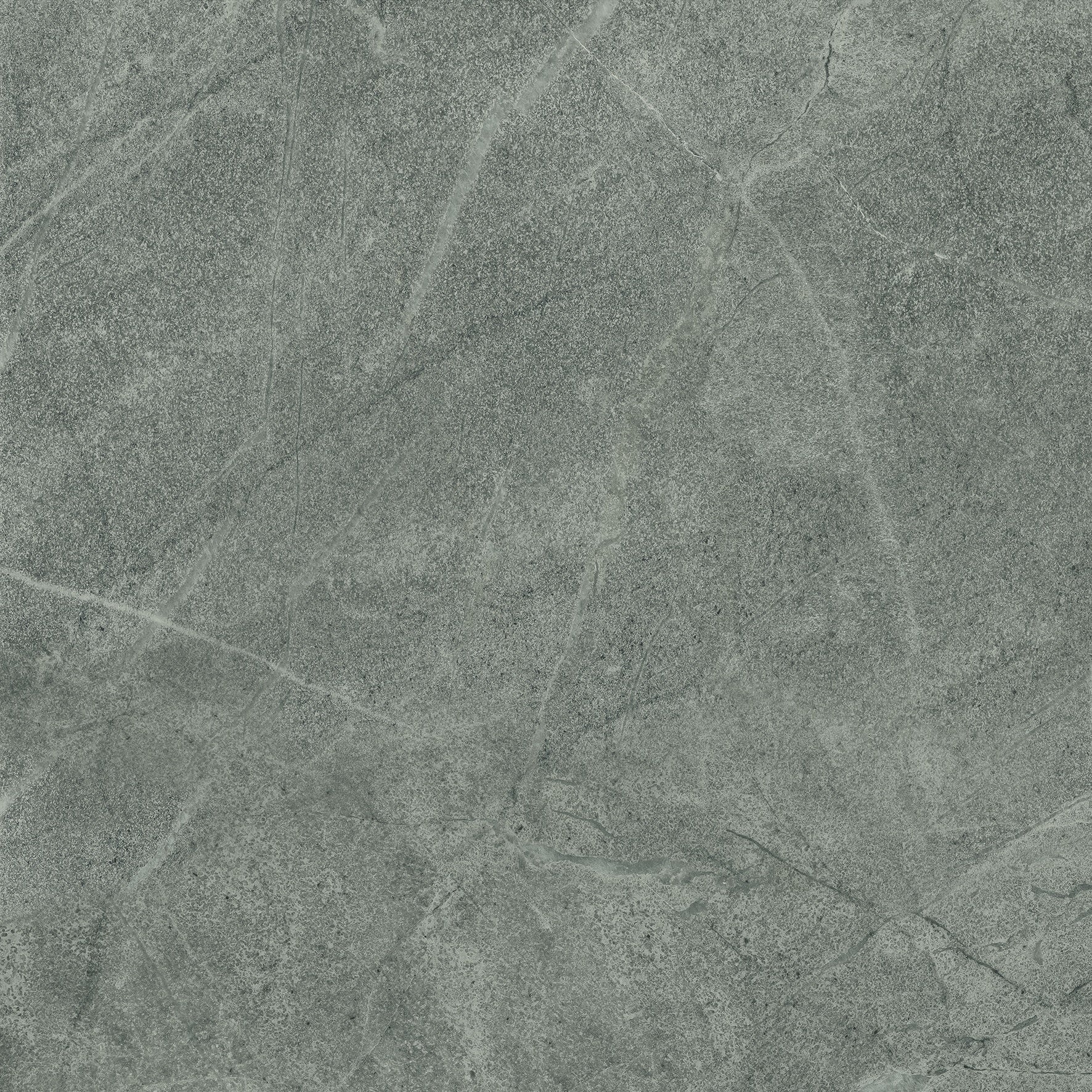 Elegant matte porcelain tile with soft bluish-grey tones, evoking the serene beauty of Haute-Savoie limestone.