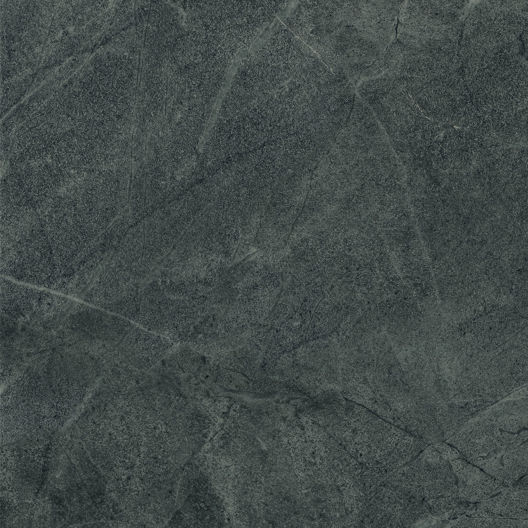 Matte dark gray porcelain tile with refined limestone texture, evoking the serene elegance of Haute-Savoie slate.