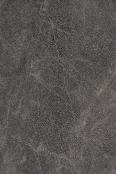 Matte dark gray porcelain tile with refined limestone texture, evoking the serene elegance of Haute-Savoie slate.