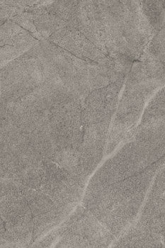 Elegant matte porcelain tile in soft bluish-gray, evoking Haute-Savoie limestone with refined crystalline texture and timeless sophistication.