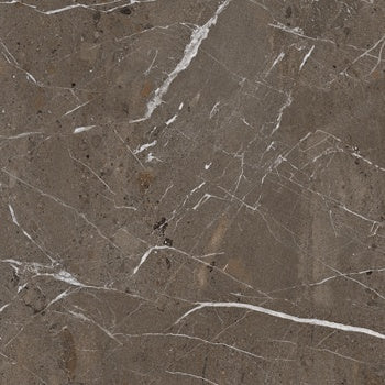 A matte taupe porcelain tile with the organic elegance of natural marble, rugged yet refined for timeless interiors.