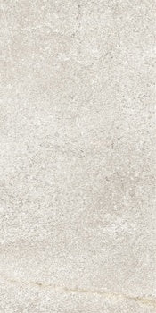 Matte white porcelain tile with rugged dolomite texture, evoking Appalachian stone’s raw, timeless elegance in a refined slate-cut finish.