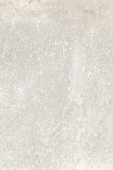 Matte white porcelain tile with a rugged slate-cut texture, evoking Appalachian dolomite—organic modern elegance for refined interiors.