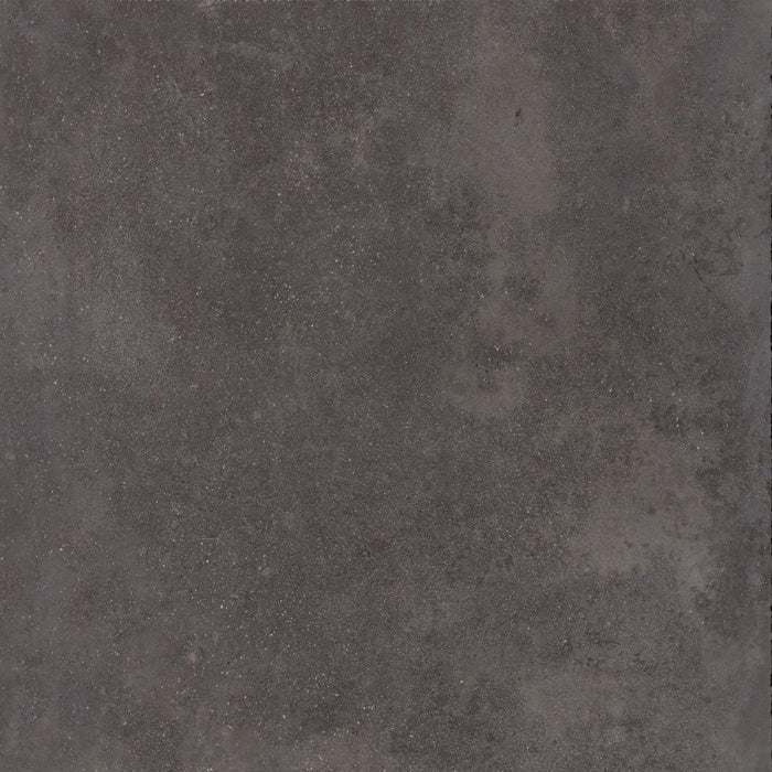 Large-format dark gray porcelain tile with a matte concrete finish, exuding urban minimalism and brutalist elegance.