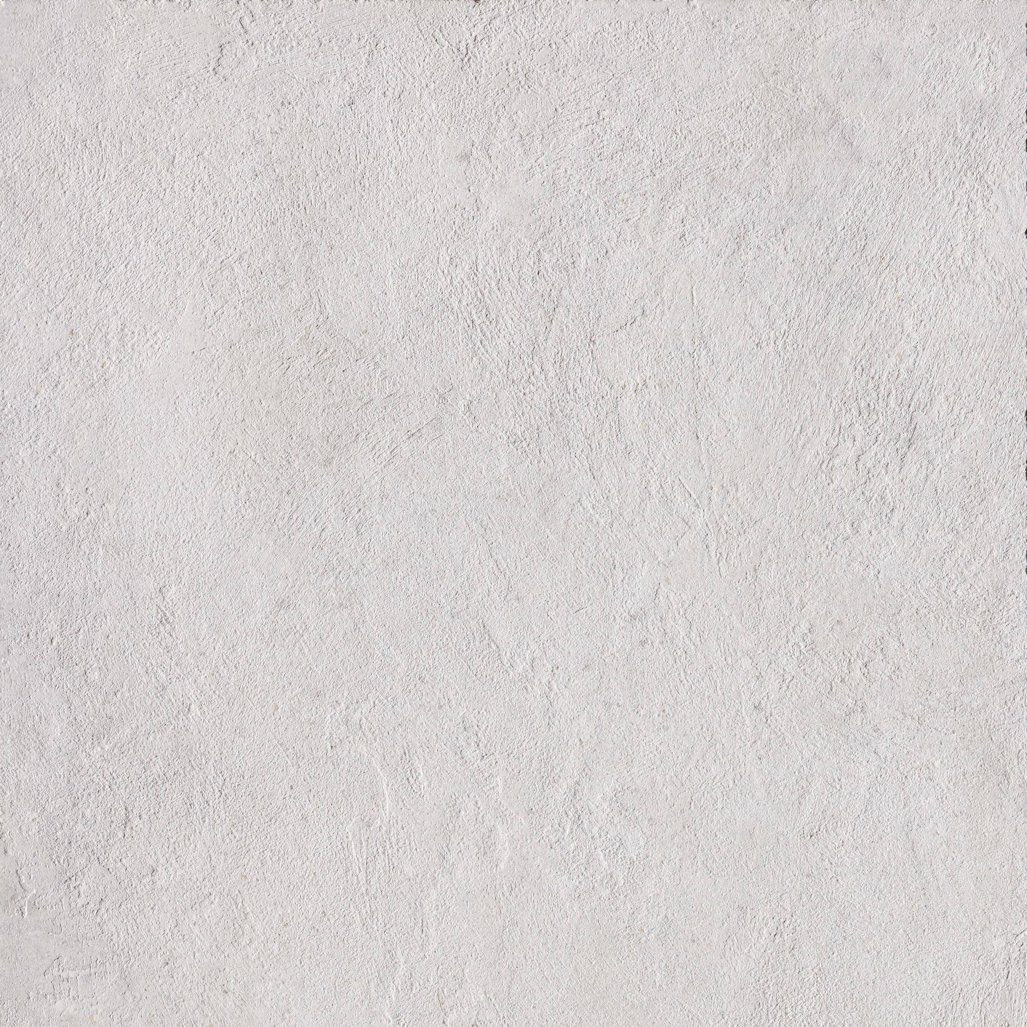 Matte white porcelain tile with refined concrete texture, exuding urban minimalism and brutalist elegance in a serene, monolithic form.