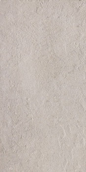 Matte white porcelain tile with refined concrete texture, exuding urban minimalism and brutalist elegance in a serene, monolithic form.