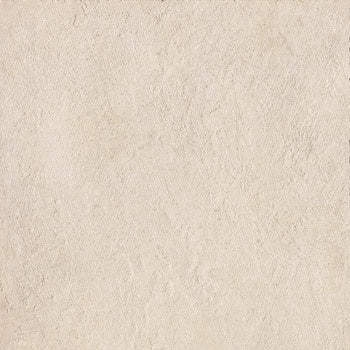 Sleek matte porcelain tile in warm almond, embodying brutalist elegance with refined concrete texture for serene urban interiors.
