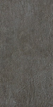 Dark gray porcelain tile with a refined concrete effect, matte finish, and contemporary urban elegance for sophisticated interiors.