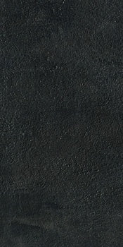 Black matte porcelain tile with refined concrete texture, exuding urban sophistication and minimalist elegance for modern interiors.