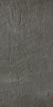Dark gray porcelain tile with a refined concrete effect, matte finish, and subtle tonal variations for minimalist, industrial elegance.