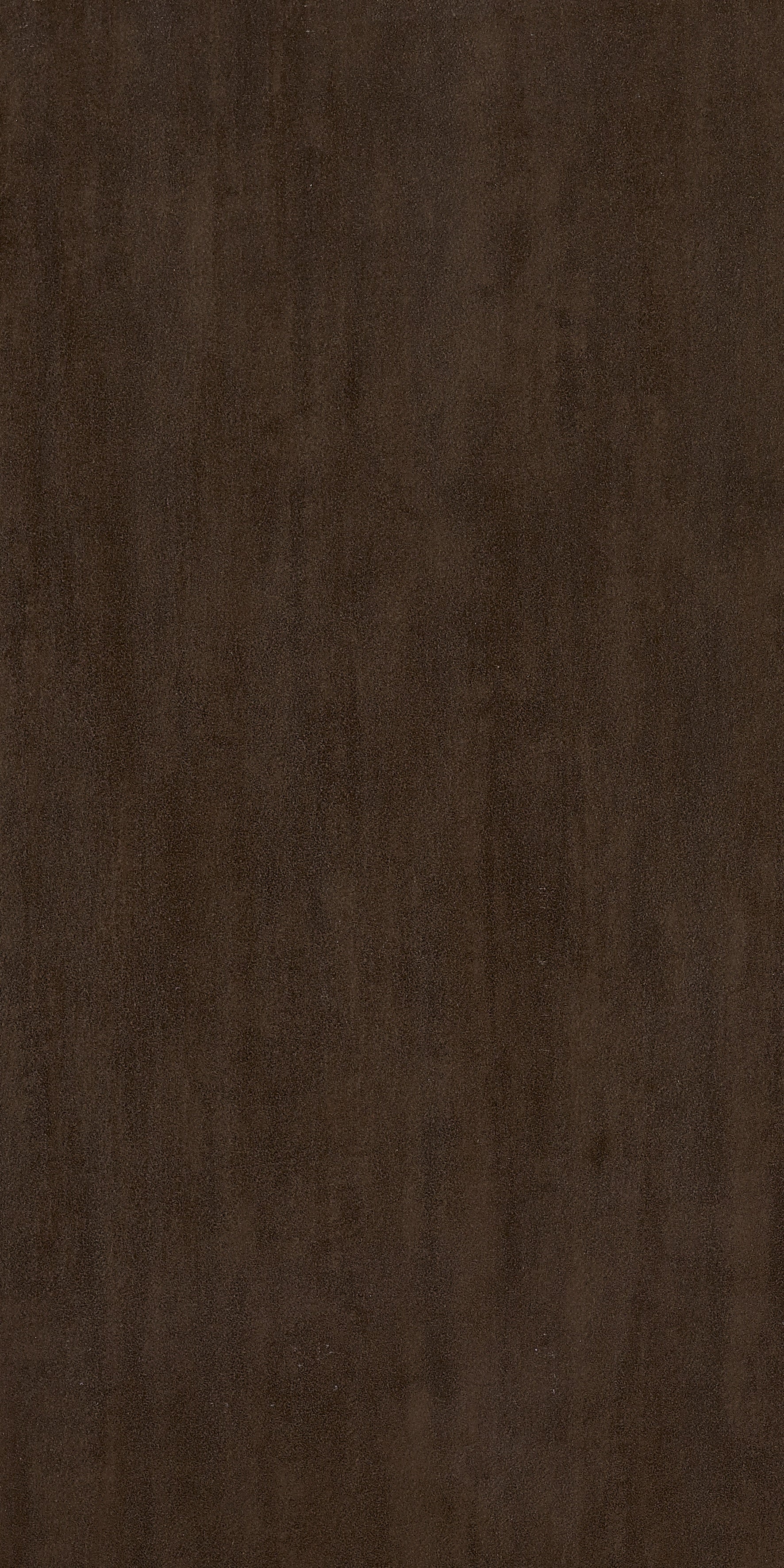 Matte brown porcelain tile with a refined, minimalist aesthetic, offering timeless elegance and understated luxury for modern interiors.