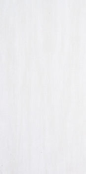 Sleek matte white porcelain tile with clean lines, refined minimalism, and timeless sophistication for modern interiors.