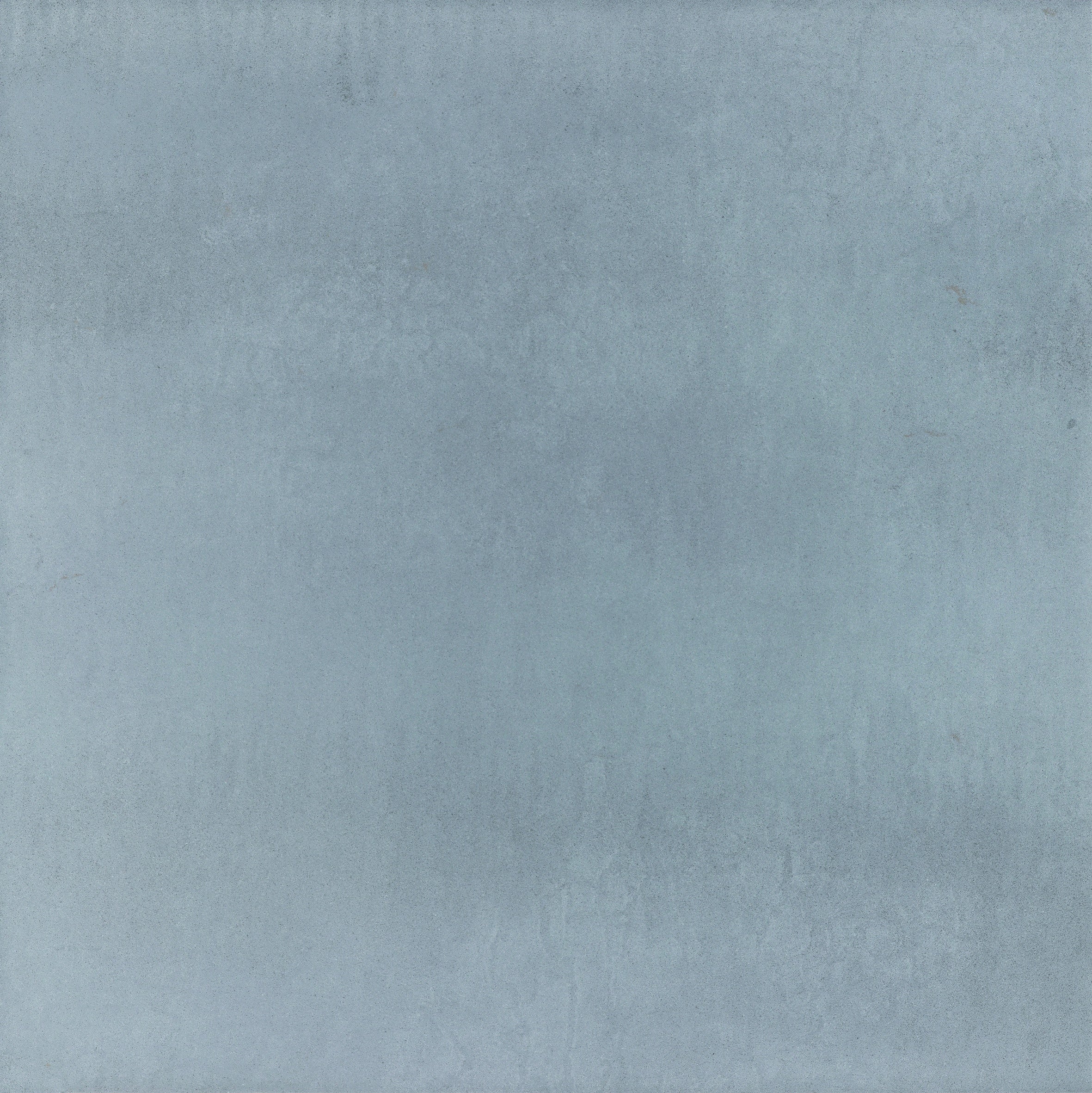 Large-format matte gray porcelain tile with a sleek, minimalist aesthetic and refined full-body texture for modern interiors.