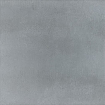Large-format matte gray porcelain tile with a sleek, minimalist aesthetic and refined full-body texture for modern interiors.
