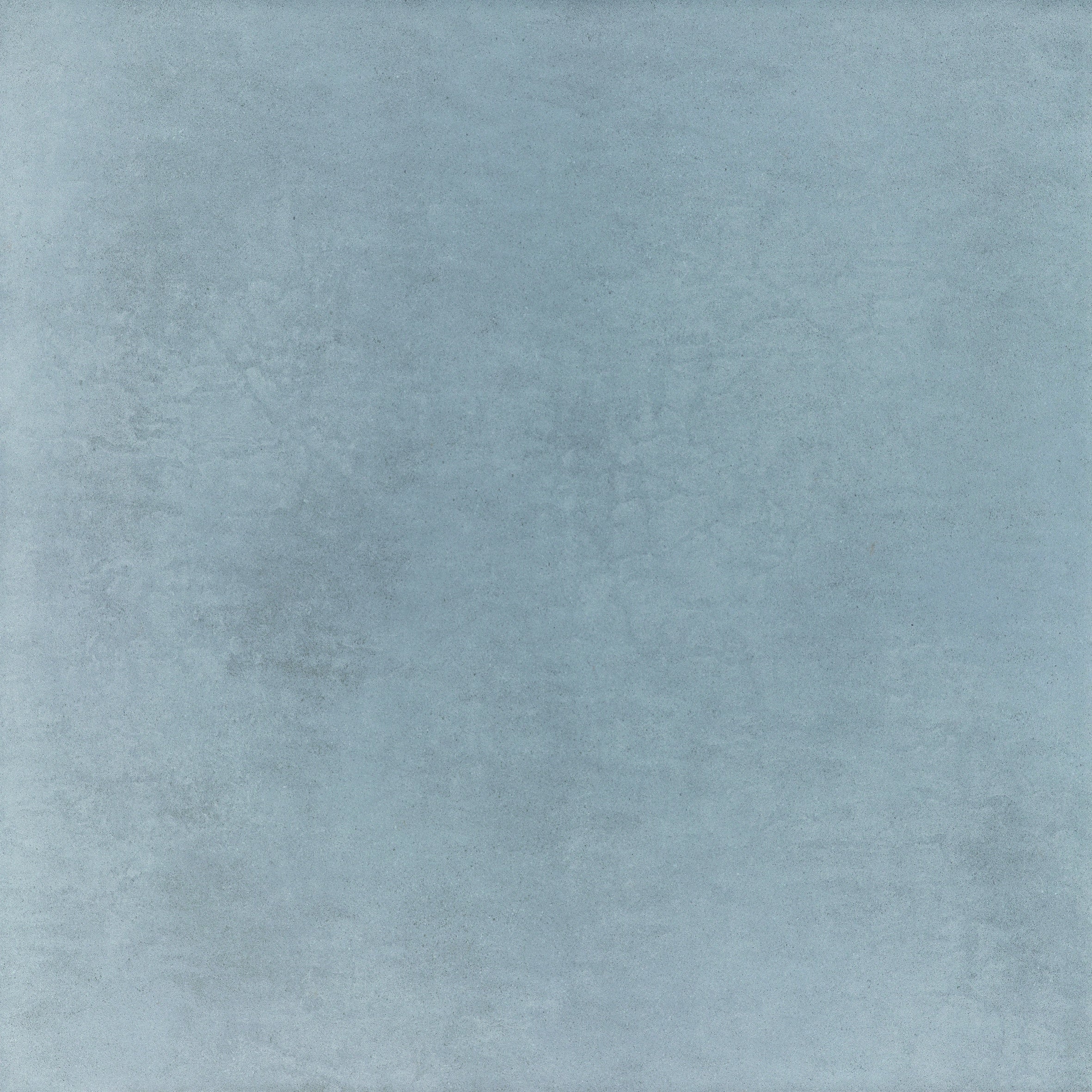 Glossy gray porcelain tile with a sleek, minimalist finish, embodying modern sophistication and timeless elegance in large-format design.