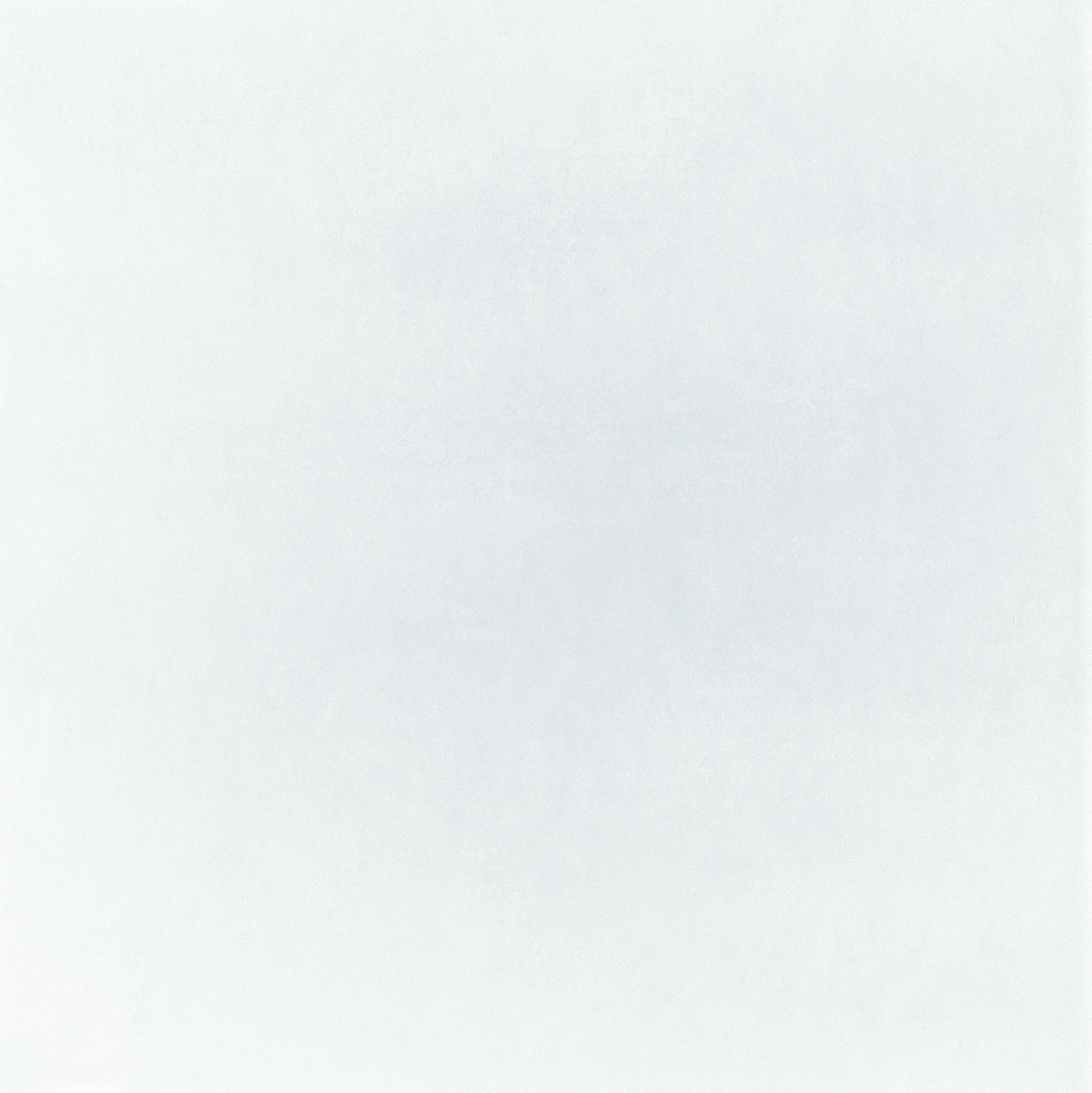 Large-format matte white porcelain tile with a sleek, minimalist aesthetic and refined pressed edges for timeless modern spaces.