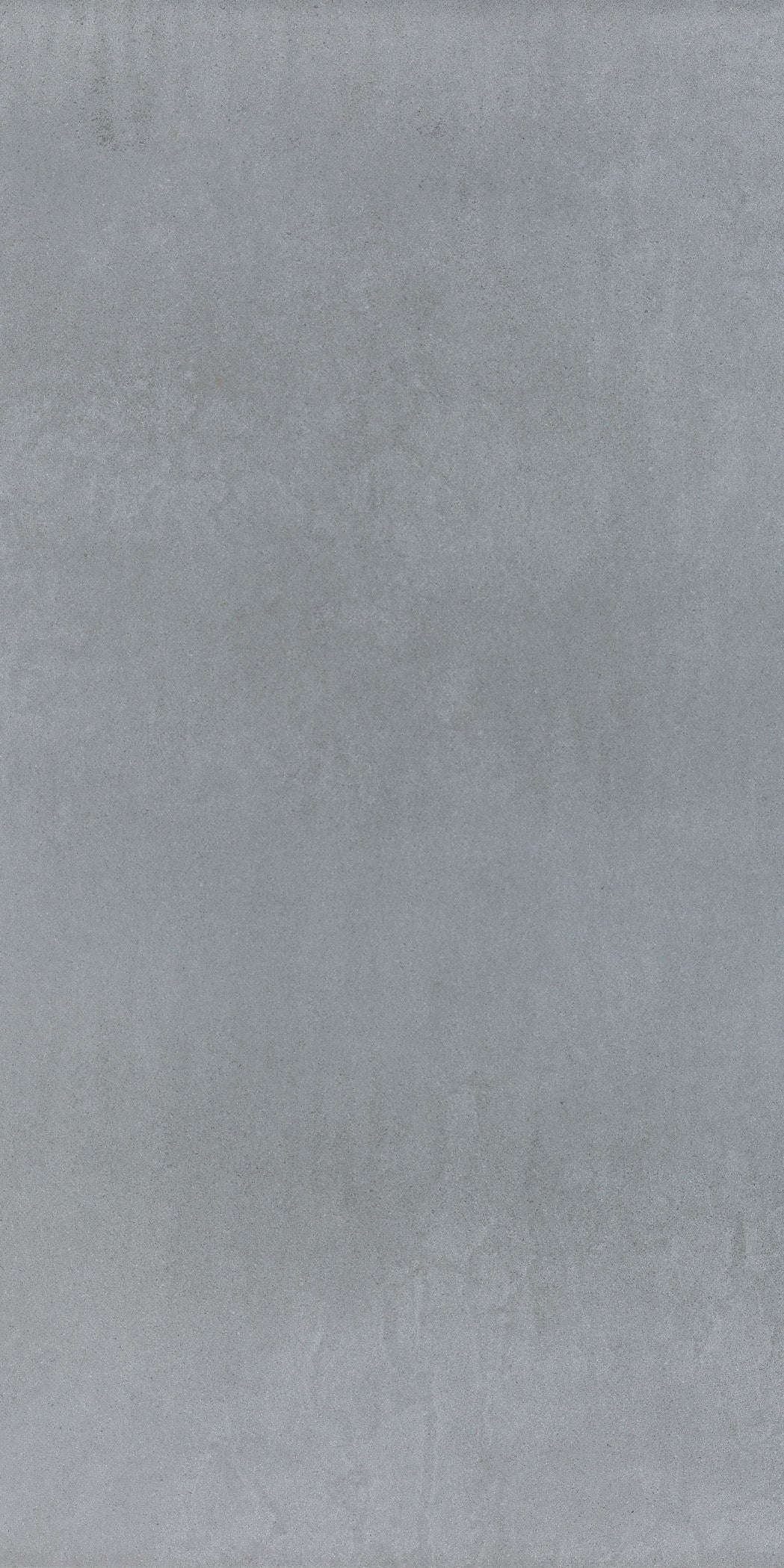 Sleek matte gray porcelain tile with refined minimalist texture, perfect for modern luxury interiors.