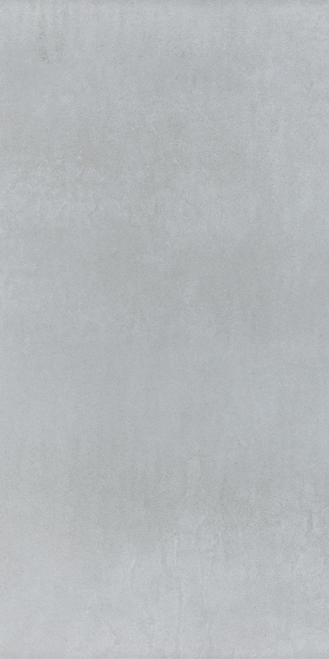 Sleek modern porcelain tile in soft ice gray, full-body matte finish, large-format rectangle with refined minimalist elegance.