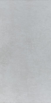 Sleek, full-body porcelain tile in polished ice gray, exuding modern sophistication with minimalist elegance and seamless rectified edges.