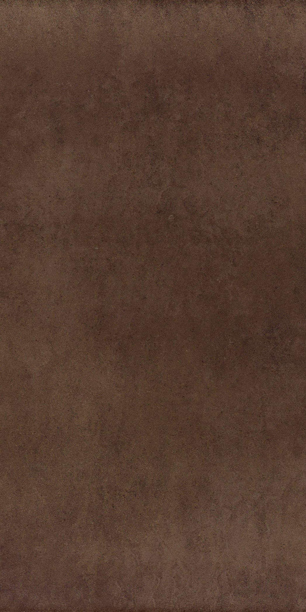 Matte brown full-body porcelain tile with a sleek, minimalist aesthetic and refined contemporary elegance for modern interiors.