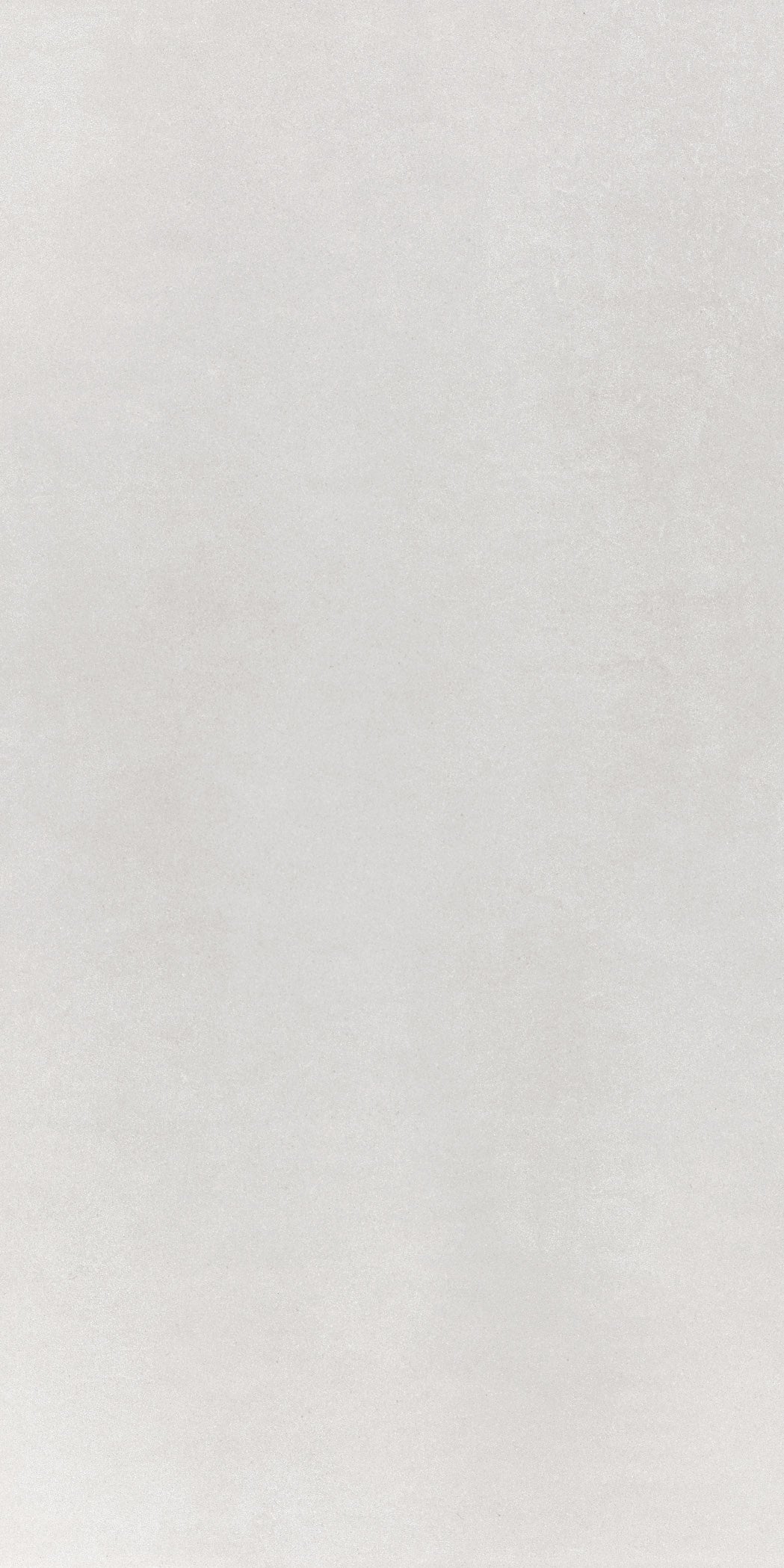 Sleek white porcelain tile with a glossy finish, embodying minimalist sophistication for modern interiors.